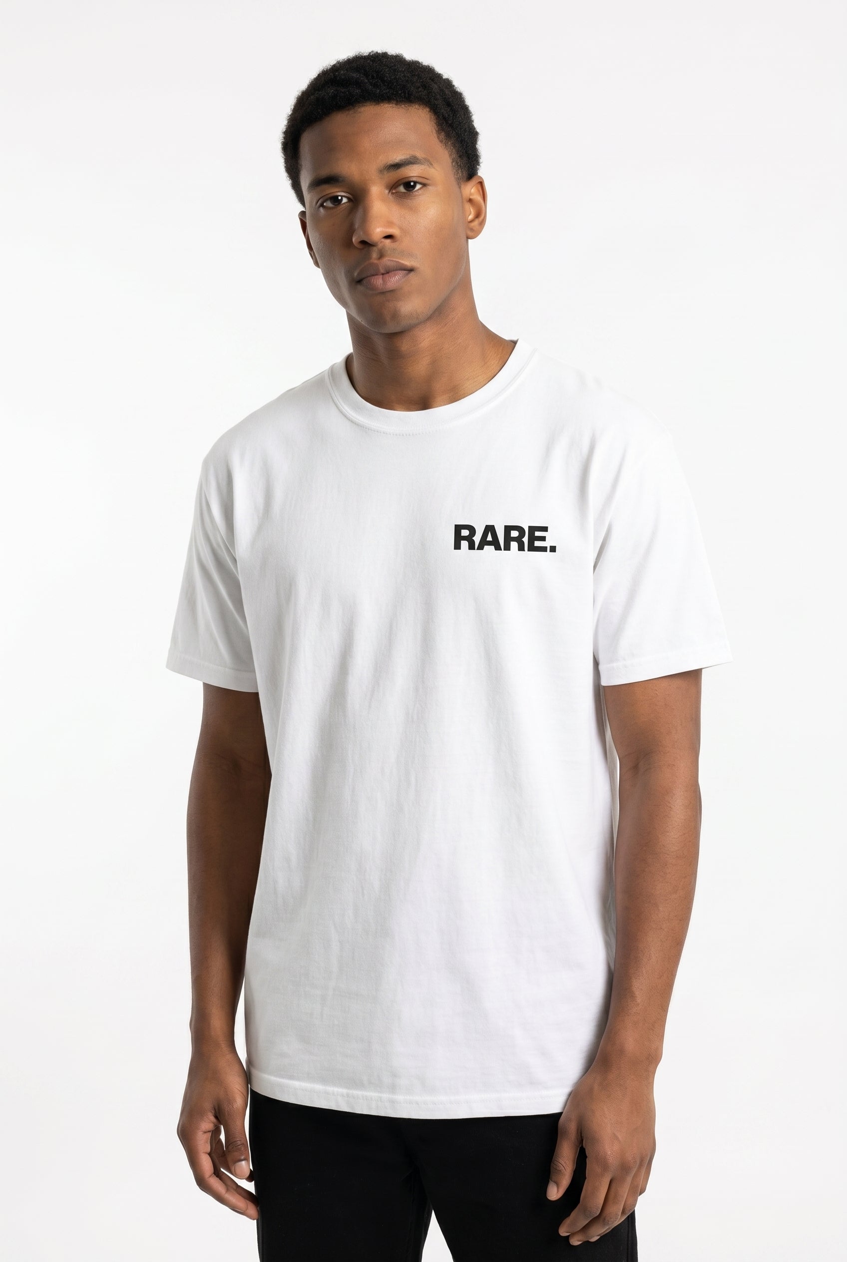 Person wearing a white t-shirt with 'RARE.' text on a white background